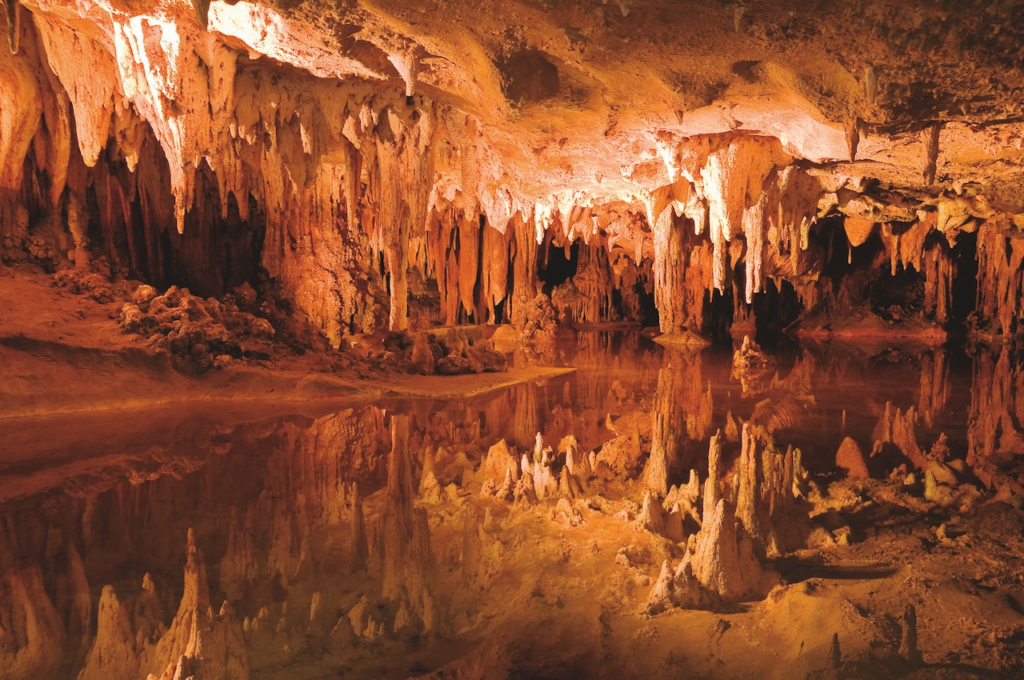 Enchanting Beauty of Stalactites and Stalagmites exploring  underwater cave Explore the hidden depths of enigmatic underwater caves